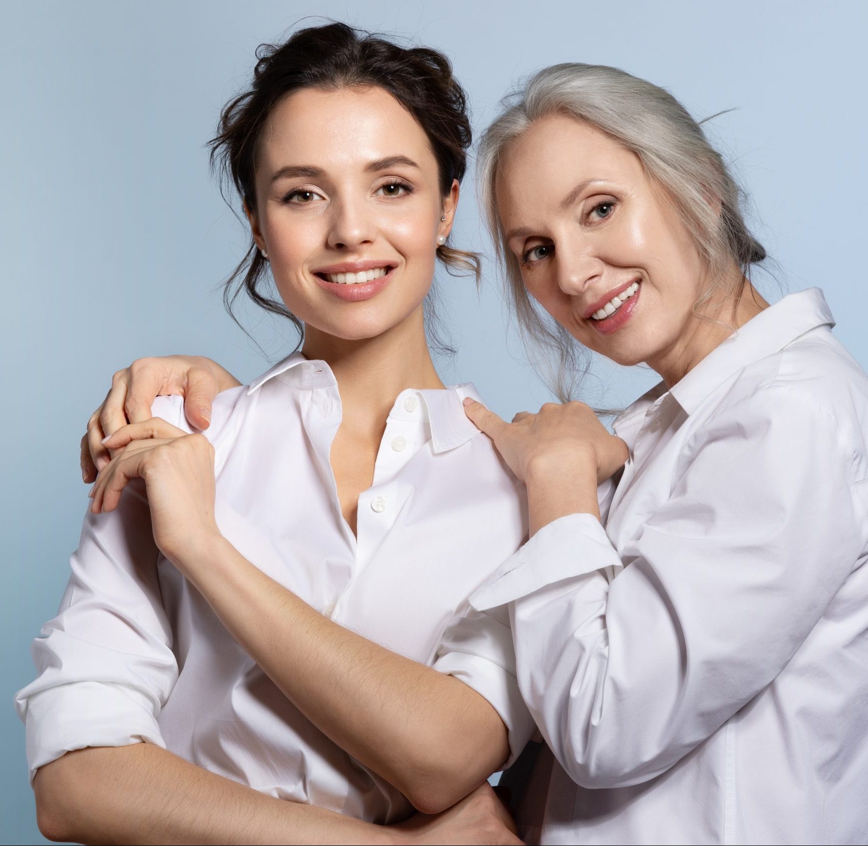 Mother and daughter embracing
