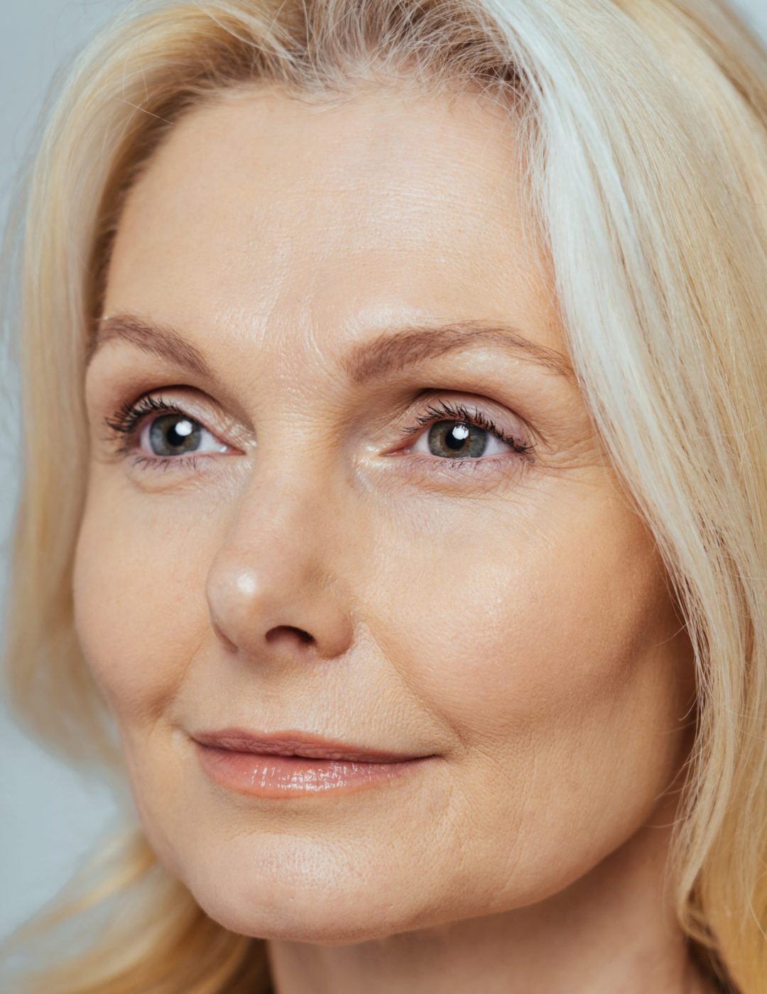 Profile view of older woman with defined cheek bones